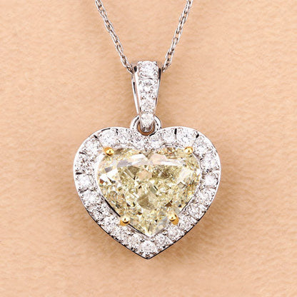 IGI Certified 4.51 Carat Genuine Light Yellow Diamond Center and 0.45cttw White Diamond 18K White Gold Pendant (4.96cttw)